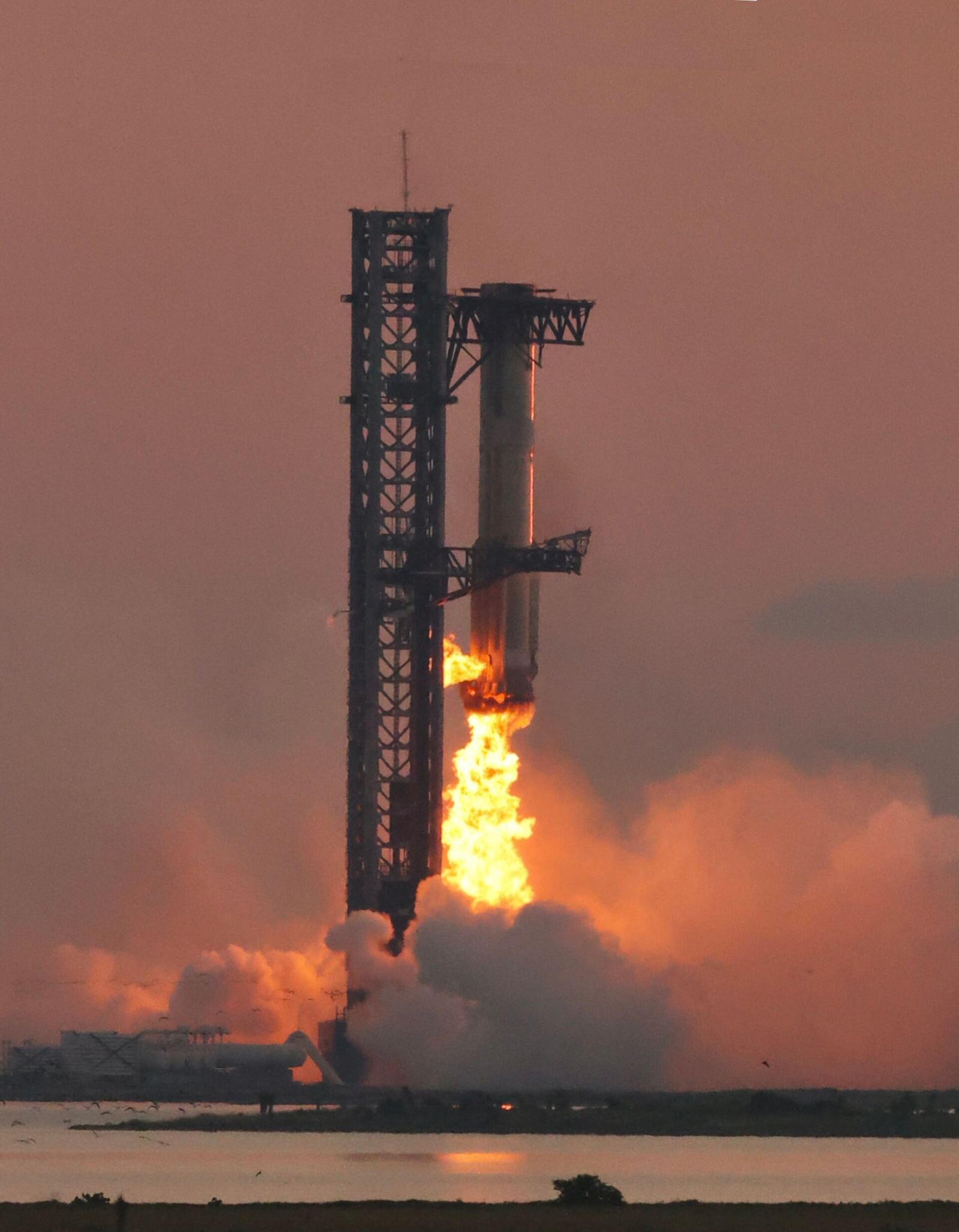 Super Heavy booster caught by the launch tower arms at Starbase, October 13, 2024