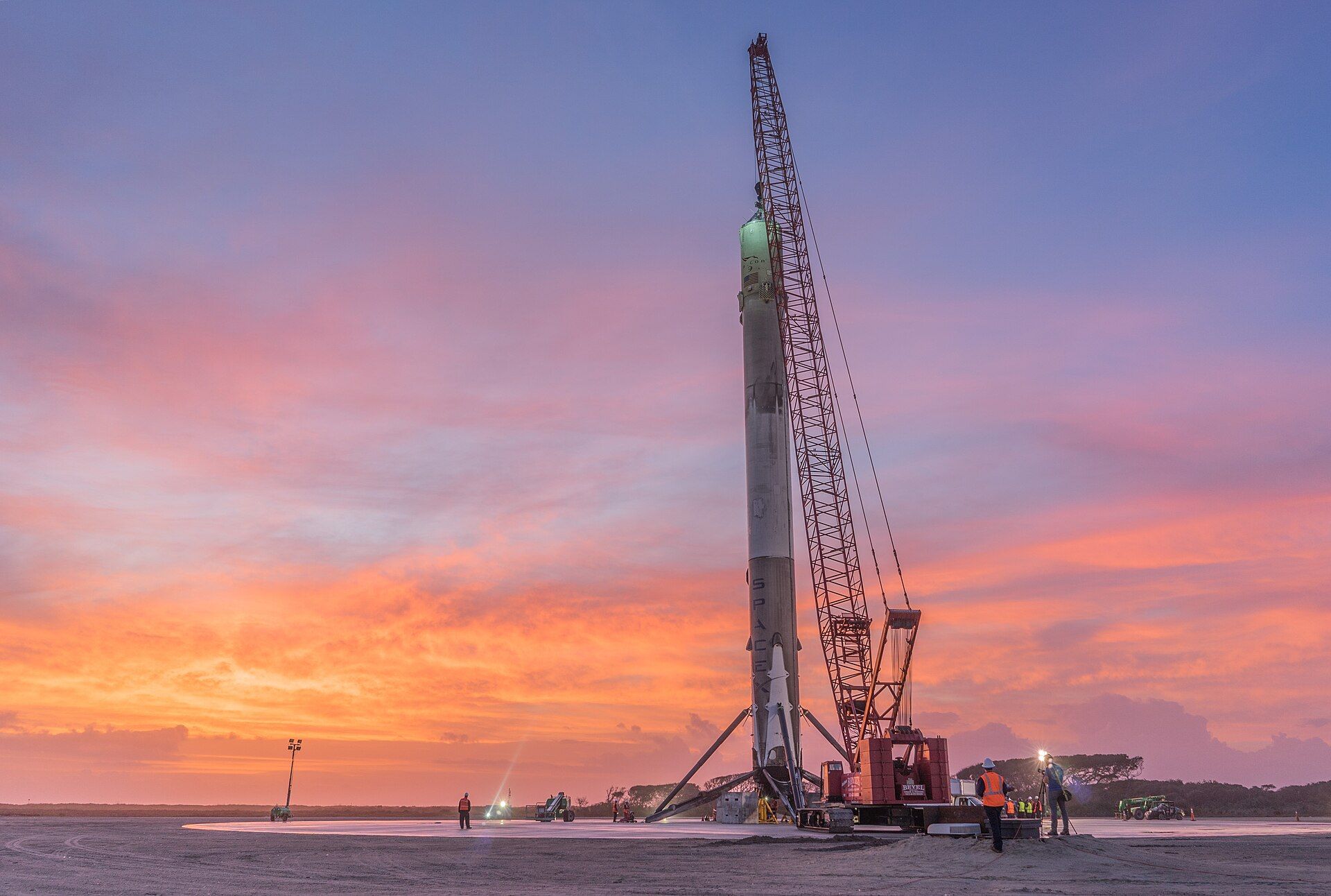 Falcon 9 first stage standing at Landing Zone 1 after the first orbital-class booster landing, December 21, 2015